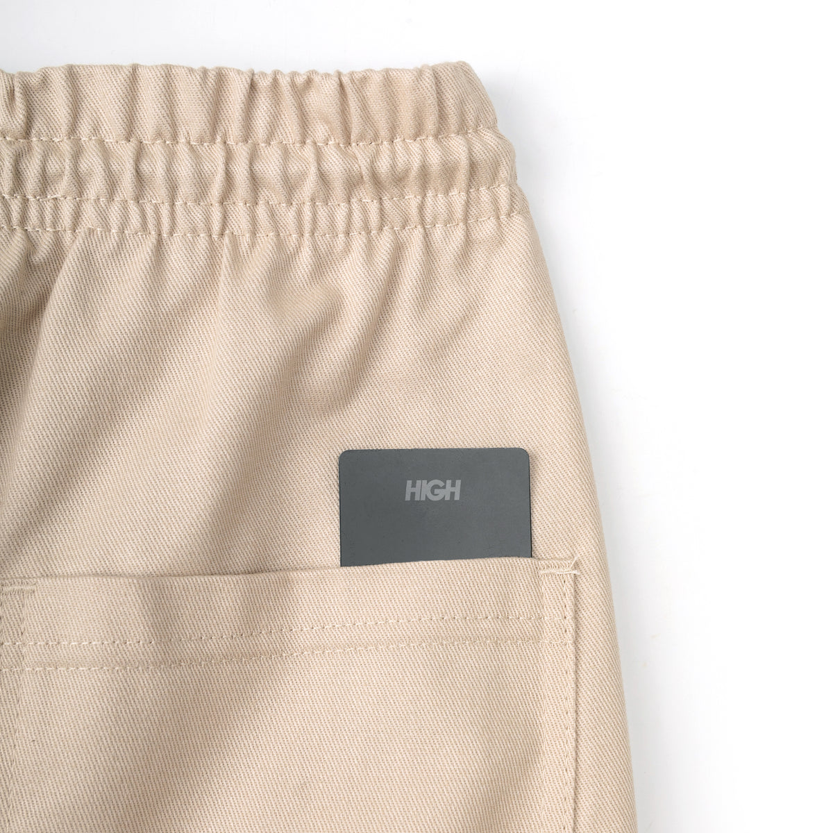 Calça Tag Bege